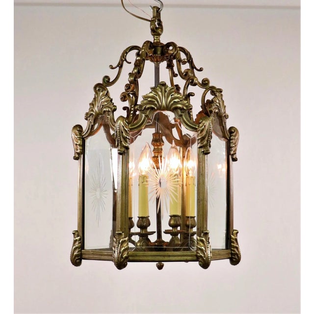 Circa 1800 French Louis XIV Bronze Lantern With Cut Glass Panels. This lantern has wonderful acanthus leaves bonze mounts....