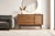 This professionally restored mid-century modern walnut cabinet beautifully showcases the clean sophistication and...