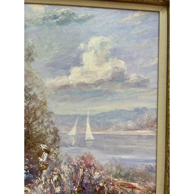 This oil painting on canvas features women gathering flowers on the shore of a lake. Two sailboats are in the distance....