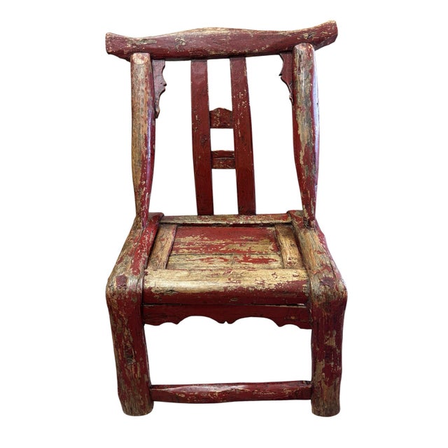 This item is an antique Chinese rustic red-lacquered side chair, typically crafted from elmwood (yumu) or cedar, dating...