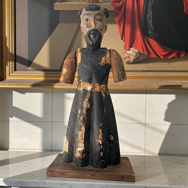 A late 19th century devotional figure carved in the Spanish Colonial tradition, retaining substantial original surface and...