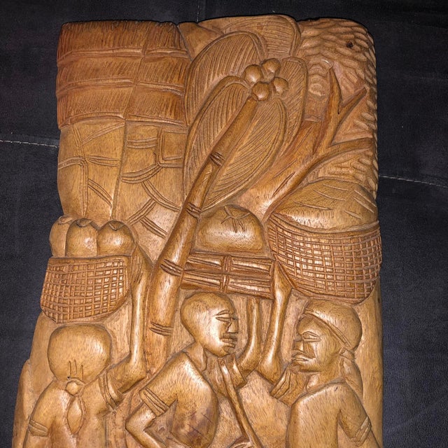 n exceptional mid-century hand-carved high-relief wood plaque by Haitian artist Abel C. Carved from a dense, solid slab of...