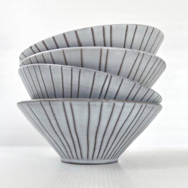 Good overall condition. Usual signs of wear, two small chips on the rim, tiny enamel chips the size of a pinhead. Diameter...