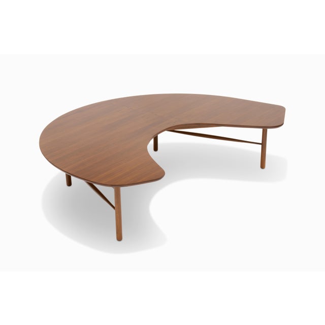 Here is a rare "Crescent" coffee table by Greta Grossman for Glenn of California. At approximately 63" x 45", the large...