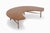 Here is a rare "Crescent" coffee table by Greta Grossman for Glenn of California. At approximately 63" x 45", the large...