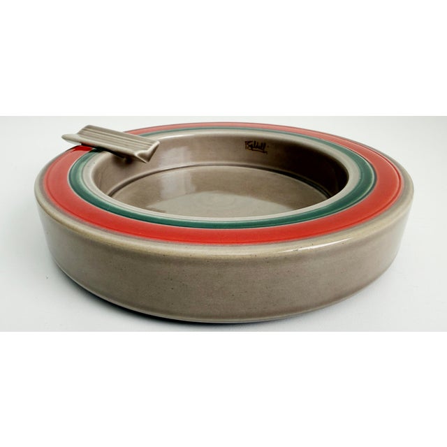 Exquisite ceramic ashtray by the renowned Italian artist Dante Baldelli, crafted in the 1970s. Lively orange and green...