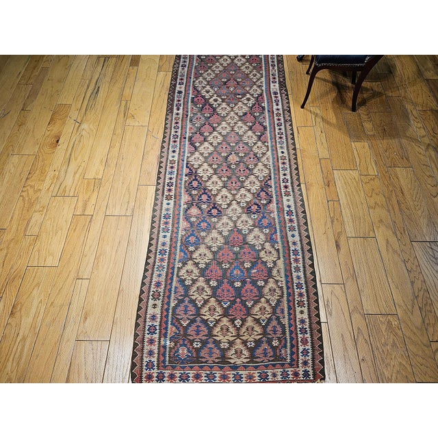 3’ 3” x 15’ 4” Vintage Persian Kilim (flat woven) runner has a brilliant geometric design and wonderful colors. Beautiful...