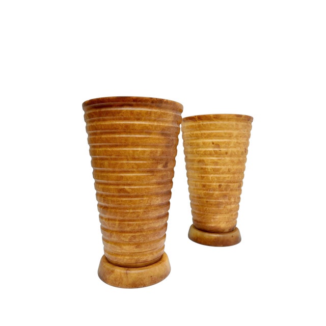 A warm set of lamps made of brown alabaster, marked “Pegasam Alabastros.” These large lamps are shaped like vases, and the...