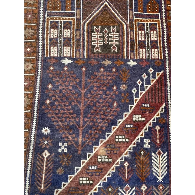 Beautiful tribal Baluch rug with a nice design and beautiful colors, entirely hand knotted with wool velvet on wool...