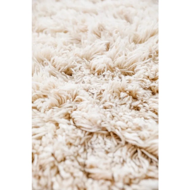 You get the ultimate cozy under foot feeling with the 3" hand-cut pile of our ultra shag reversible rug. This rug was...