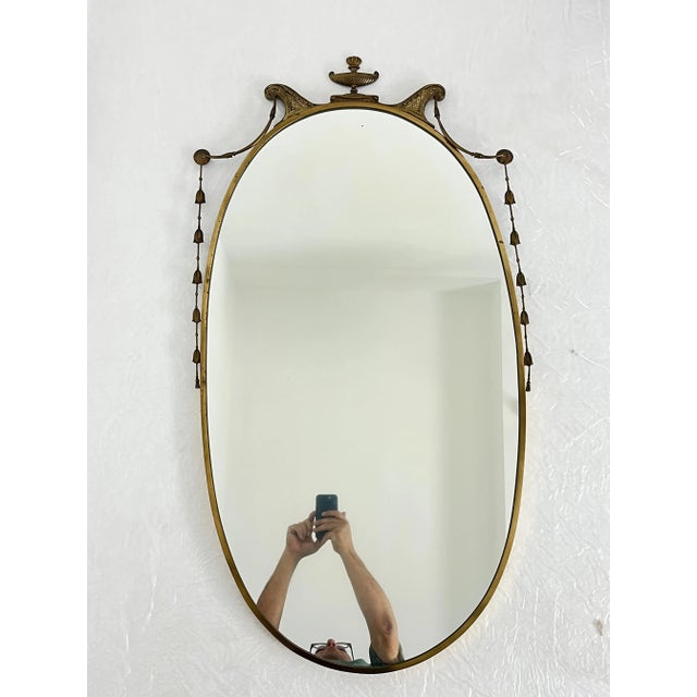 Elegant brass wall mirror, made in Italy, 1960s Good condition, small signs of aging. Found in a stately apartment in my...