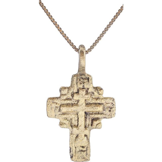 Gilt bronze, just over 1 1/8” (1.18”) total height. Broad cross, the terminals with cipher in fill. A vacant cross with...