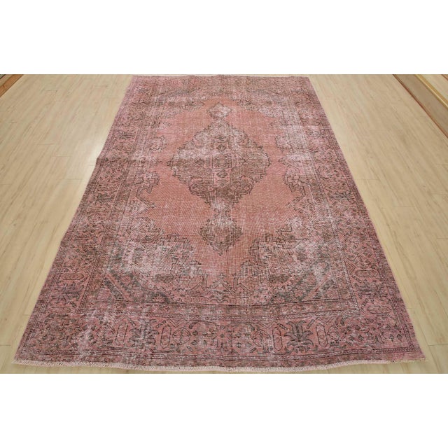 An authentic vintage traditional Overdyed Tabriz rug hand-knotted with an all-wool pile on a cotton foundation. This rug...