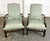 This pair of arm chairs features sea-foam green upholstery with a raised geometric texture, complemented by dark wood...