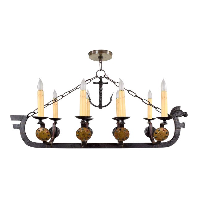 Antique Gothic or Spanish Revival Style Cast Iron Chandelier Viking Longboat Ship With Horse Head and Shields For Sale