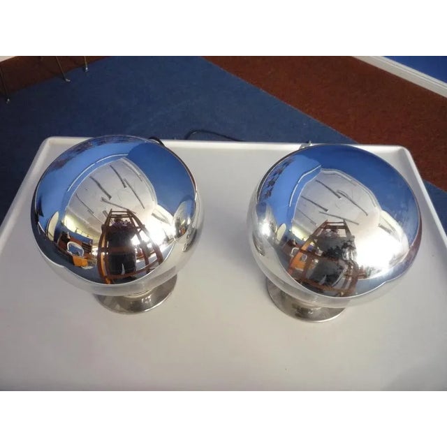 This pair of table lamps was designed by Motoko Ishii for Staff in the 1960s. They are made from glass. One lamp features...