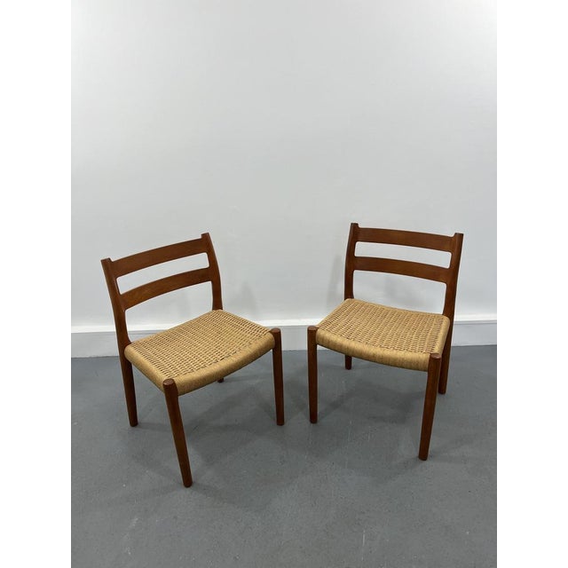 This set of Scandinavian dining chairs designed by Niels O. Møller was manufactured by J.L. Møllers in Denmark. The set...