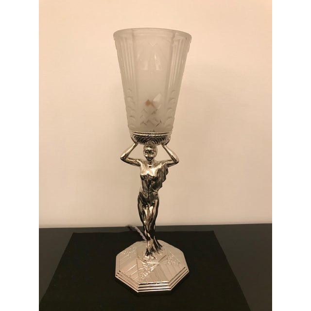 Beautiful French Art Deco table lamp. Clear frosted glass shade having geometric motif signed by Muller Frères Luneville....
