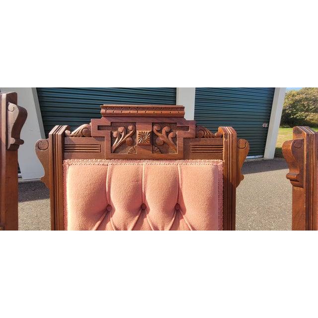 A super fine set of antique Victorian parlor chairs covered in a pale blush pink fabric possibly velor or velvet. Each...