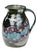A striking vintage studio pottery pitcher featuring an expressive crystalline glaze in layered shades of cobalt blue,...