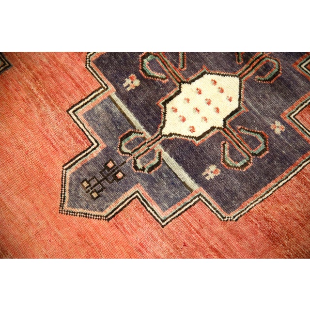 Introducing a one-of-a-kind vintage Turkish hand-knotted wool rug, carefully crafted by skilled artisans using traditional...