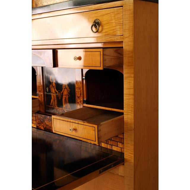 Rare secretary desk in the style of Stobwasser, Braunschweig region, with ebonized pediment, columns, central door with...