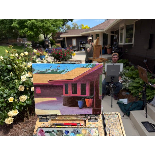 This artwork depicts a vibrant exterior of a house, characterized by bold colors and geometric forms that create a sense...