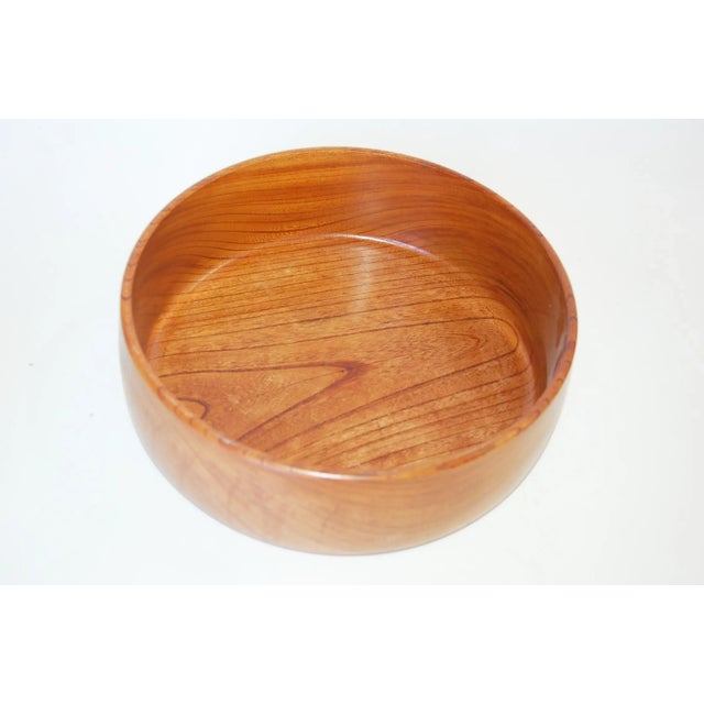 Mid Century Teak Salad Serving Bowl with the quality of Dansk, made in Denmark. Measures 4" High x 11" Diameter.