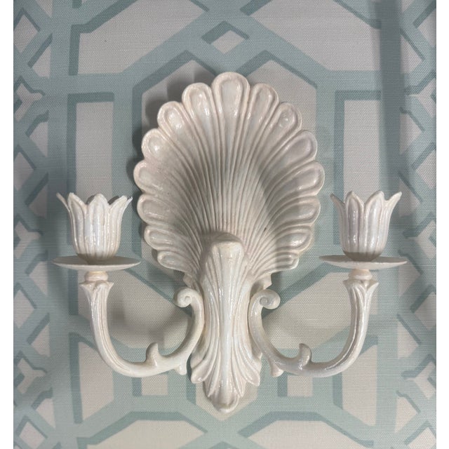 Bring a Touch of coastal elegance to any space with this charming pair of hand-painted shell wall sconces. Featuring...