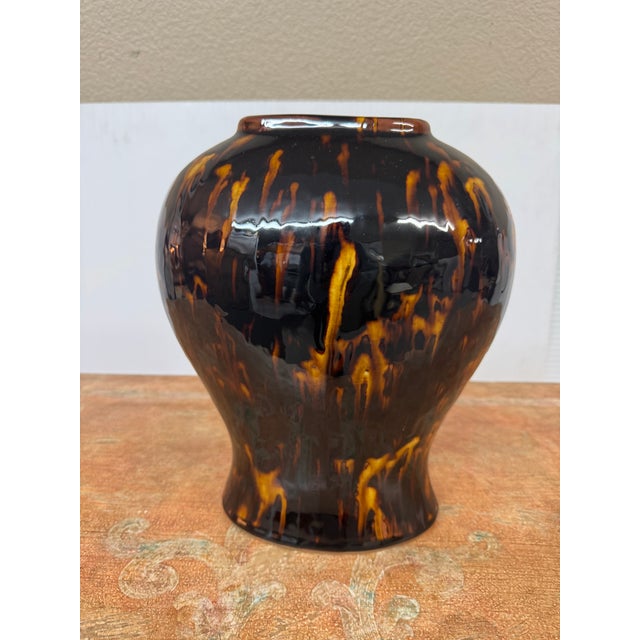 Design Plus Gallery presents a Glazed Ceramic Temple Jar from Martino Interiors. Its glossy tortoiseshell pattern combines...