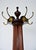 Fine quality jas shoolbred figured and solid walnut coat stand, having five original double hooks in brass on revolving...