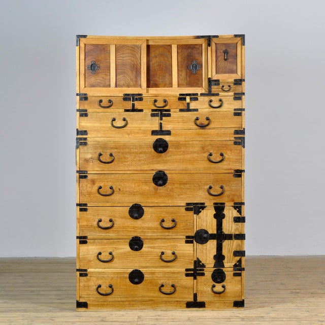 Traditional Japanese Tansu chest of drawers dating from the 1880s, crafted during the late Meiji era (1868–1912). This...