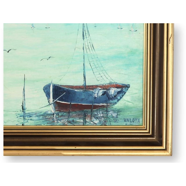 Signed Valota, this mid-20th century coastal painting captures the timeless rhythm of life along the Italian Riviera,...