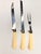 Mid-Century Wavecrest Regent Sheffield Carving set with two knives and a serving fork. Stainless steel and bakelite...