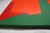 This striking square canvas features a bold, minimalist composition: a solid green background interrupted by an organic,...