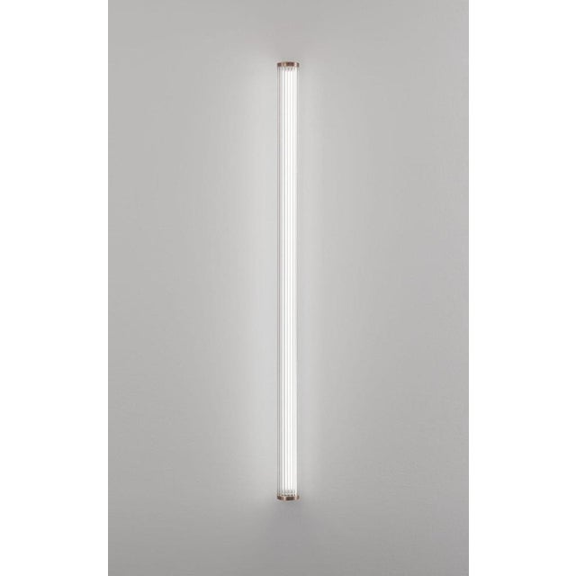 Large vanity bronze plated wall lamp, 360° free rotation, by aggiolight dimensions: d 8.2 x w 7 x h 120 cm. Materials:...