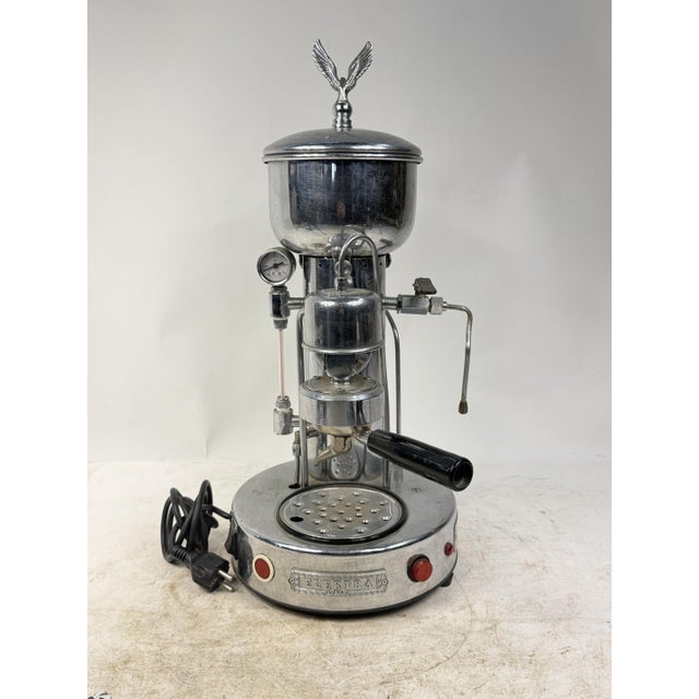 An elegant espresso machine made in Italy that combines classic column design with modern technology for professional...