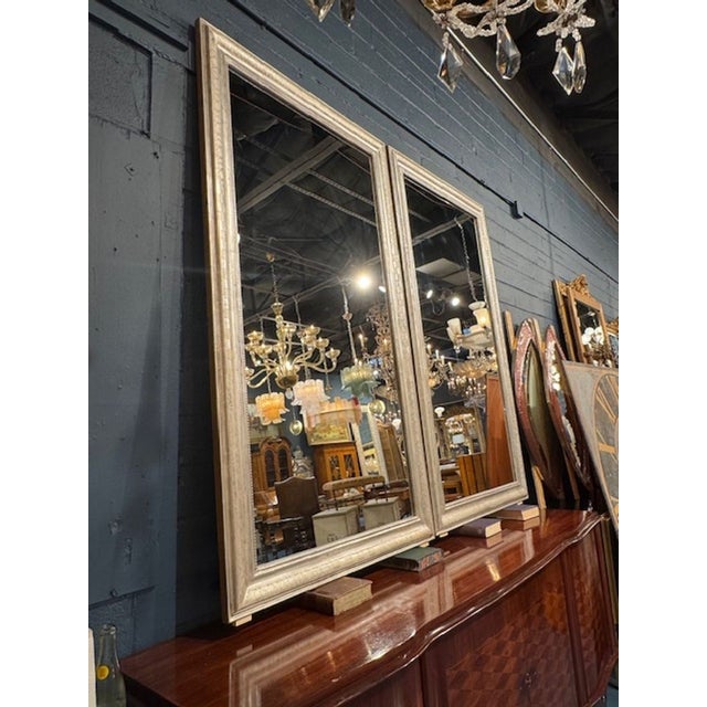 Fine pair of silver rectangular Louis Philippe mirrors with graphic pattern. Mixes well with a variety of decors. A lovely...