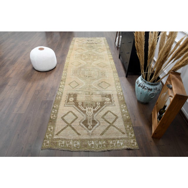 Vintage Hand-Knotted area rug is a semi-antique vintage area rug. The '70s Eastern region of Anatolian's unique rug is...