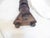 This walnut pricket stick comes with a candle and measures 29"H without the candle and 35"H with the candle.