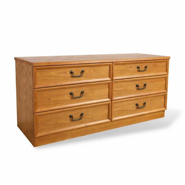 A compact G Plan low sideboard from the 1980s, finished in warm oak veneer with clean-lined proportions. Featuring...