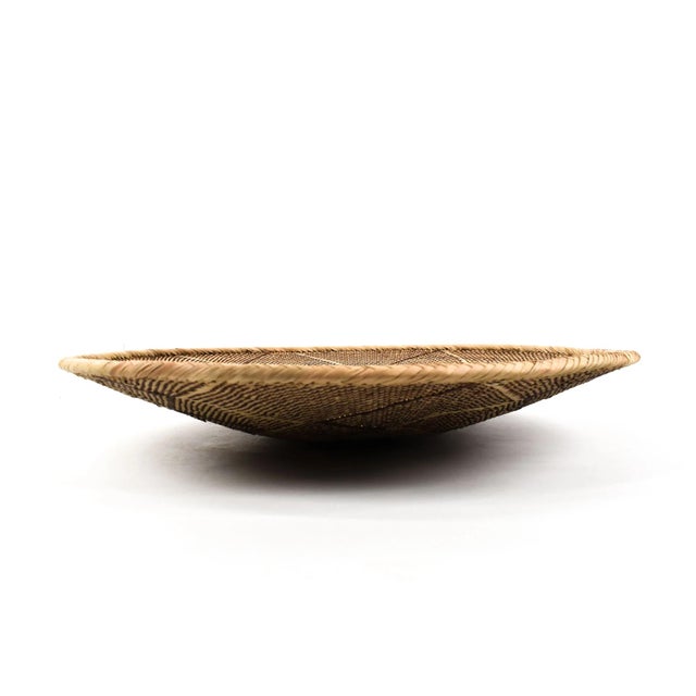 Tonga Binga baskets are traditional handcrafted baskets made by the Tonga women of Binga district in Zimbabwe. Crafted...