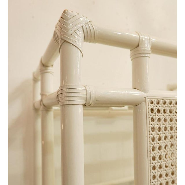 Pair of Lacquered canework shelves, Bamboo and Glass, 1980s - Italy Wear consistent with age and use. Measures : 69cmx42cm...