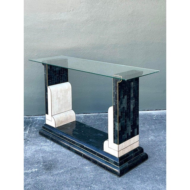 This striking console table is a magnificent expression of Art Deco Revival, utilizing bold geometry and dramatic material...