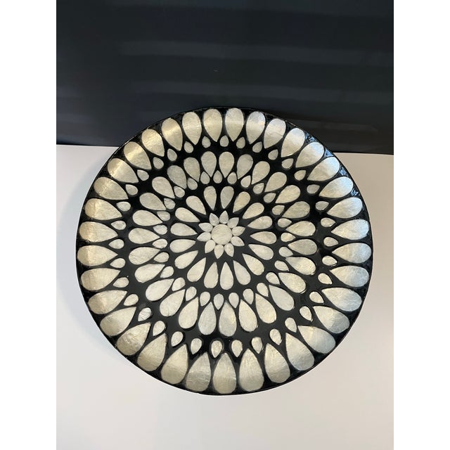 A stunning handmade black and ivory Capiz shell inlay decorative pedestal cake stand plate. Each Capiz shell piece is...