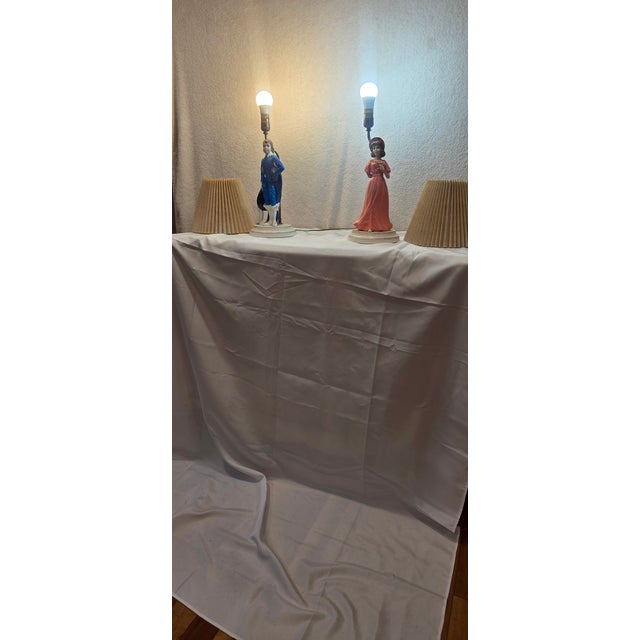 Charming vintage matching pair of Pinkie and Blue Boy figural table lamps, inspired by two of the most beloved portraits...