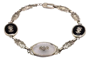 The 48th Street: Antique Art Deco Camphor Glass Bracelet set with Diamonds and Onyx