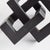 A geometric marvel, this linear sculpture is a strong, substantial accent in matte black. Place atop a stack of books or...