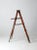 An early 20th century wooden painter’s ladder with a classic A-frame form and a beautifully timeworn presence. The surface...