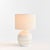 With a rounded ceramic body and a hatch mark pattern, this lamp adds a bit of character to any setting. Topped off with a...